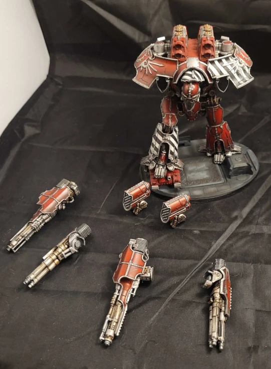 Giant war machine with swappable weapons