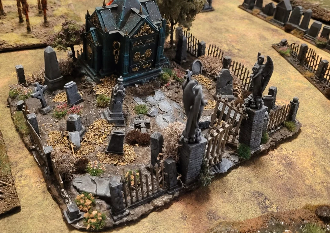 Graveyard with mausoleum and angel statues